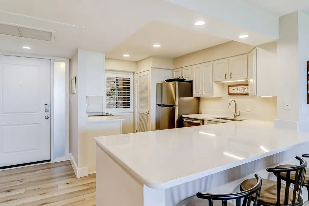 Beachfront escape with pools, hot tub, WiFi, washer dryer, & central AC