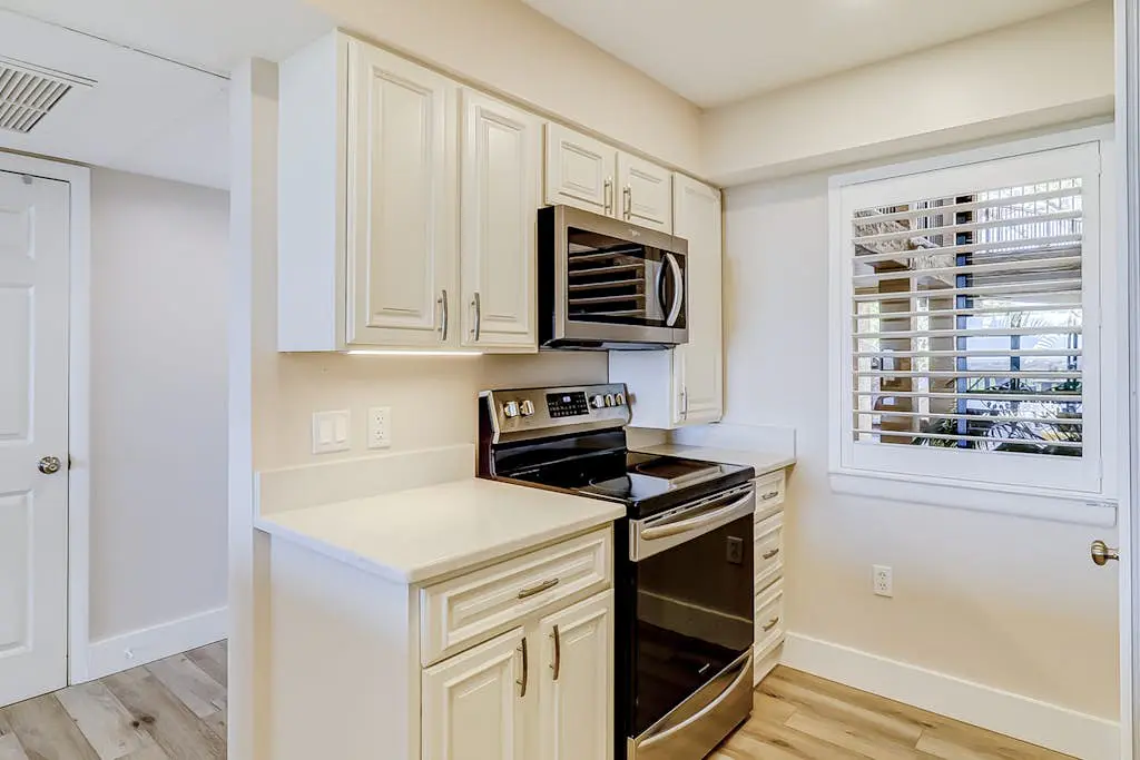 Beachfront escape with pools, hot tub, WiFi, washer dryer, & central AC