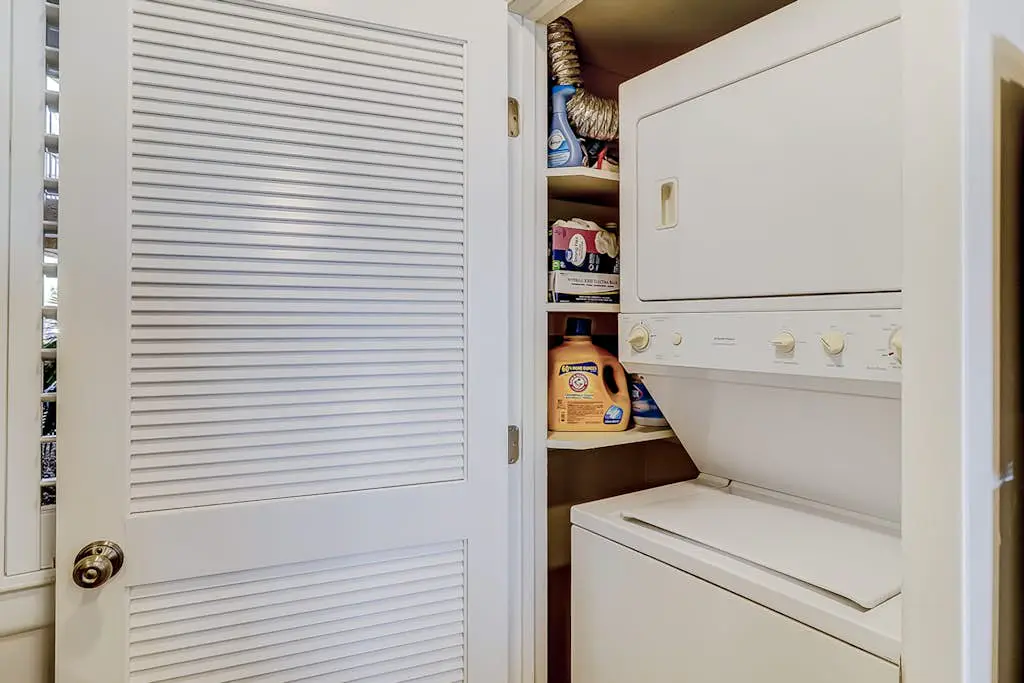 Beachfront escape with pools, hot tub, WiFi, washer dryer, & central AC