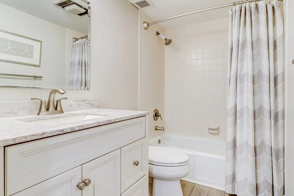 Beachfront escape with pools, hot tub, WiFi, washer dryer, & central AC
