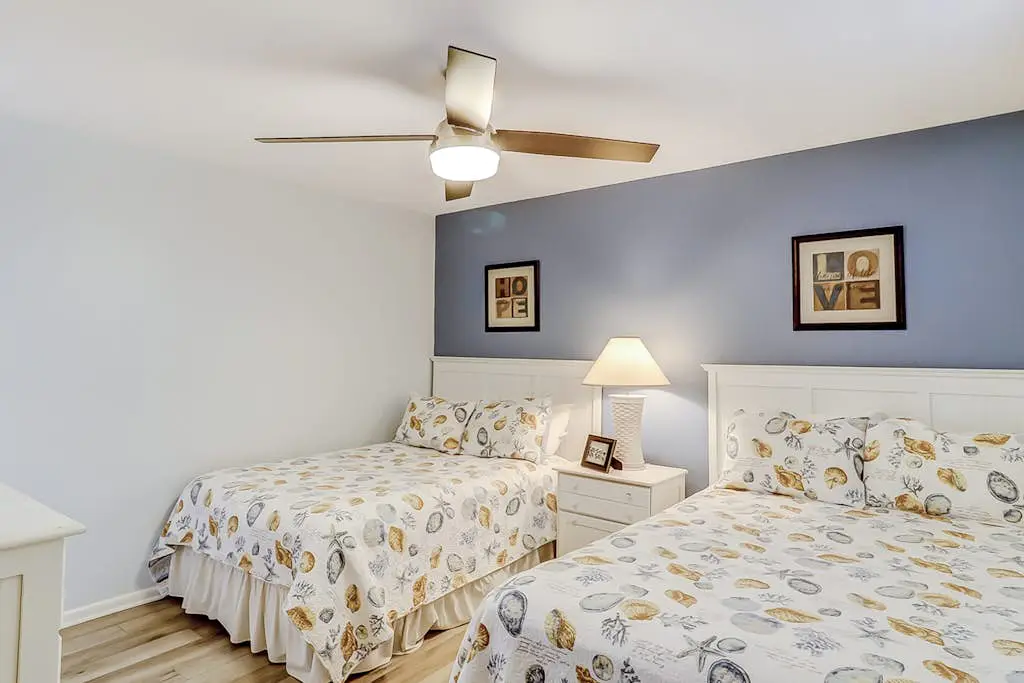 Beachfront escape with pools, hot tub, WiFi, washer dryer, & central AC