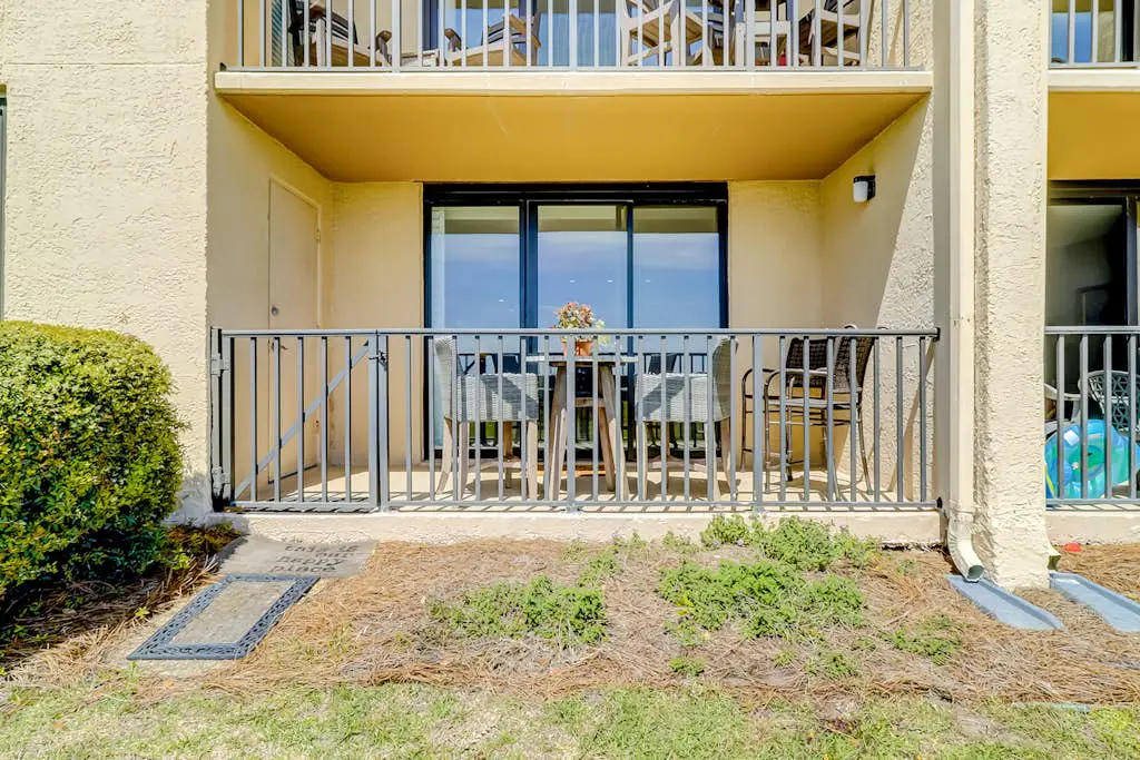 Beachfront escape with pools, hot tub, WiFi, washer dryer, & central AC