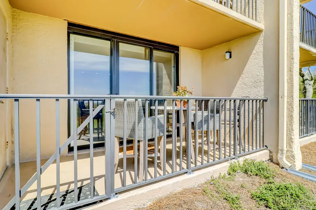 Beachfront escape with pools, hot tub, WiFi, washer dryer, & central AC