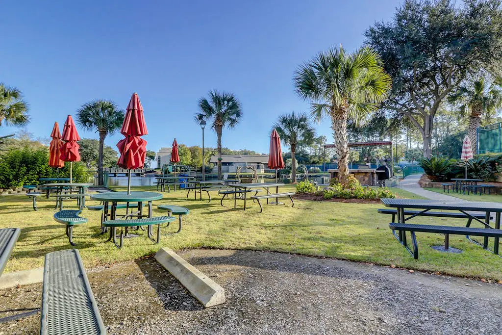 Beachfront escape with pools, hot tub, WiFi, washer dryer, & central AC