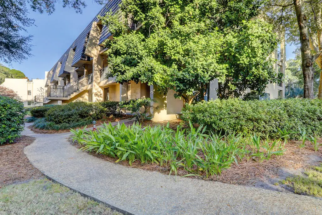 Beachfront escape with pools, hot tub, WiFi, washer dryer, & central AC