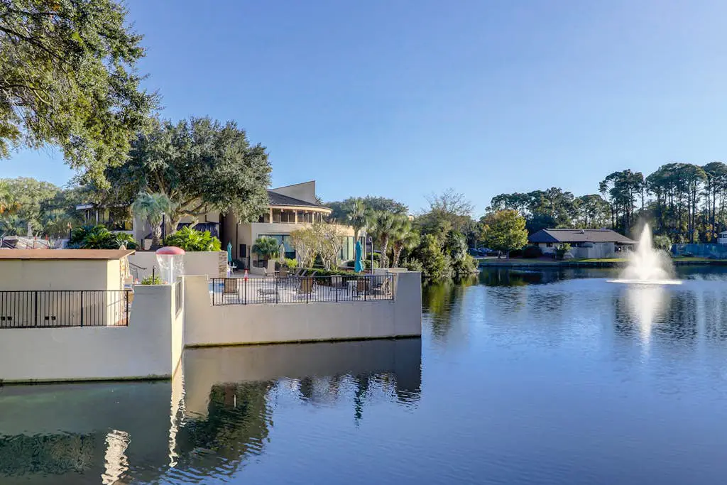Beachfront escape with pools, hot tub, WiFi, washer dryer, & central AC