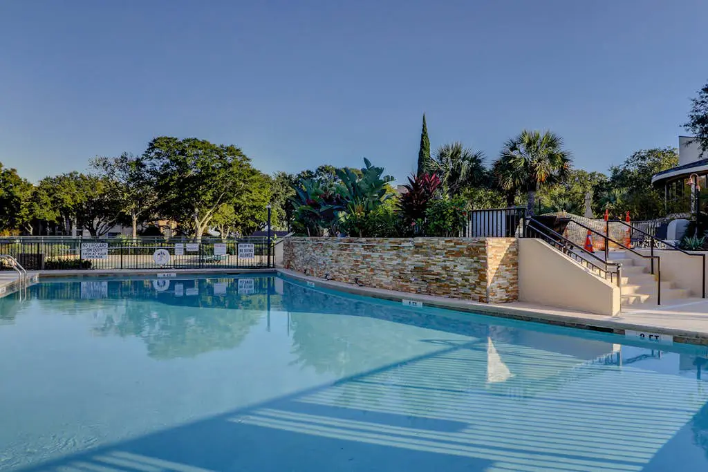Beachfront escape with pools, hot tub, WiFi, washer dryer, & central AC