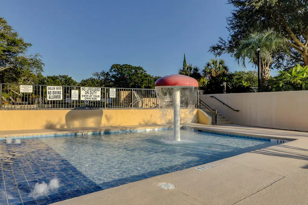Beachfront escape with pools, hot tub, WiFi, washer dryer, & central AC