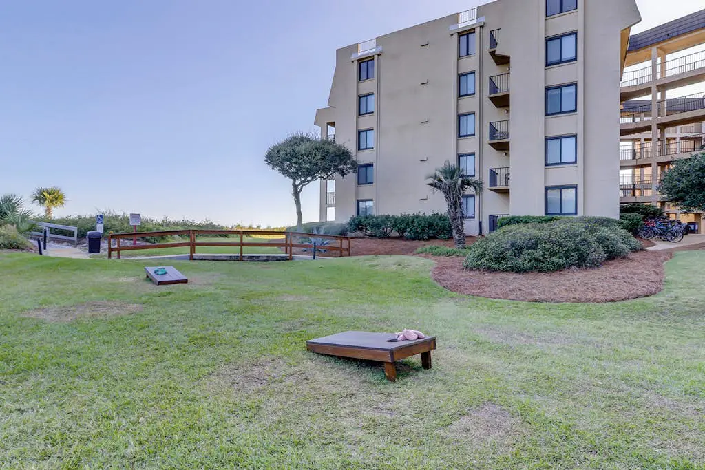 Beachfront escape with pools, hot tub, WiFi, washer dryer, & central AC