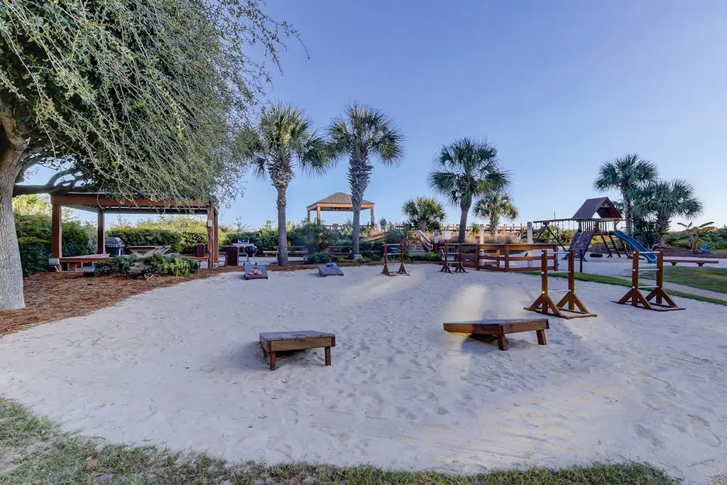 Beachfront escape with pools, hot tub, WiFi, washer dryer, & central AC