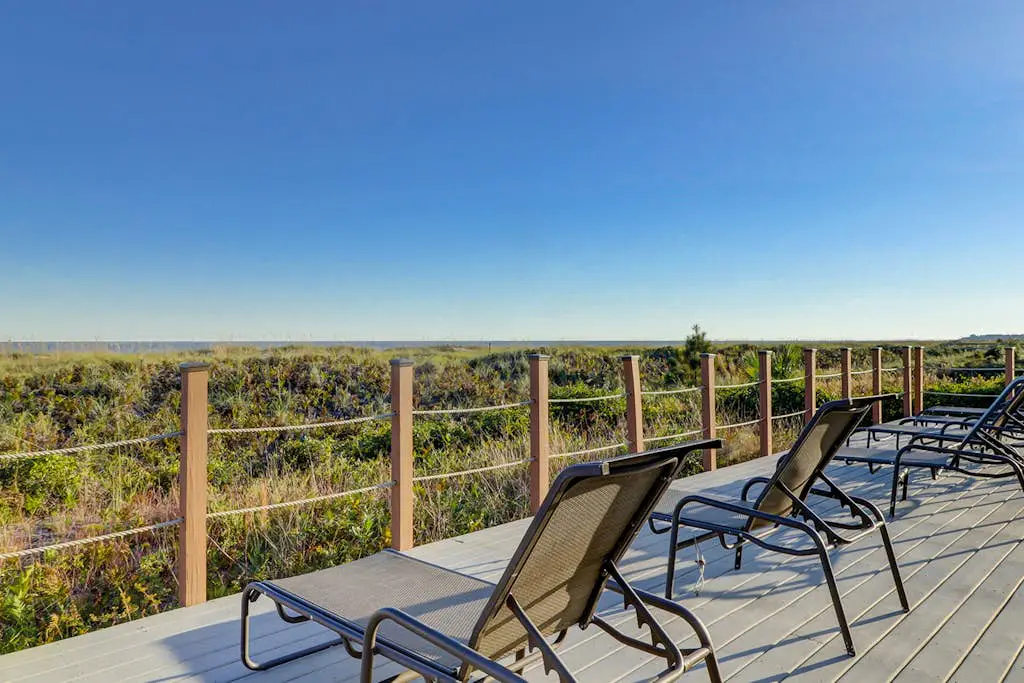 Beachfront escape with pools, hot tub, WiFi, washer dryer, & central AC