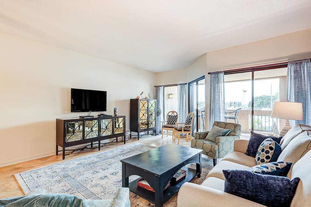 Waterfront condo with walkable locale, central AC, washer/dryer, & shared pool