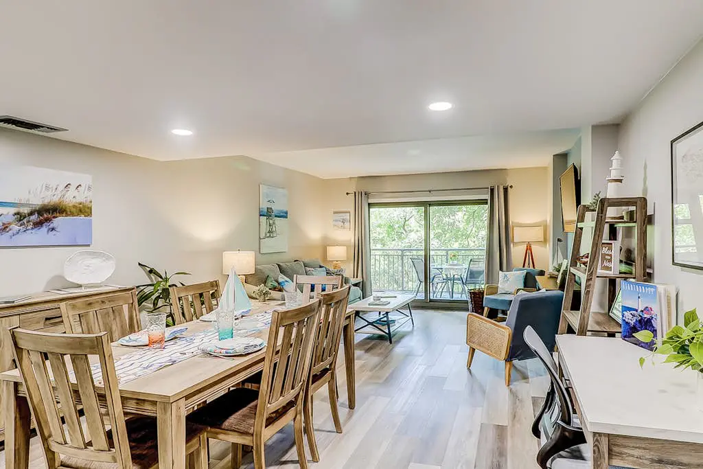 4th-floor villa with balcony, beach access, outdoor pool, & grills