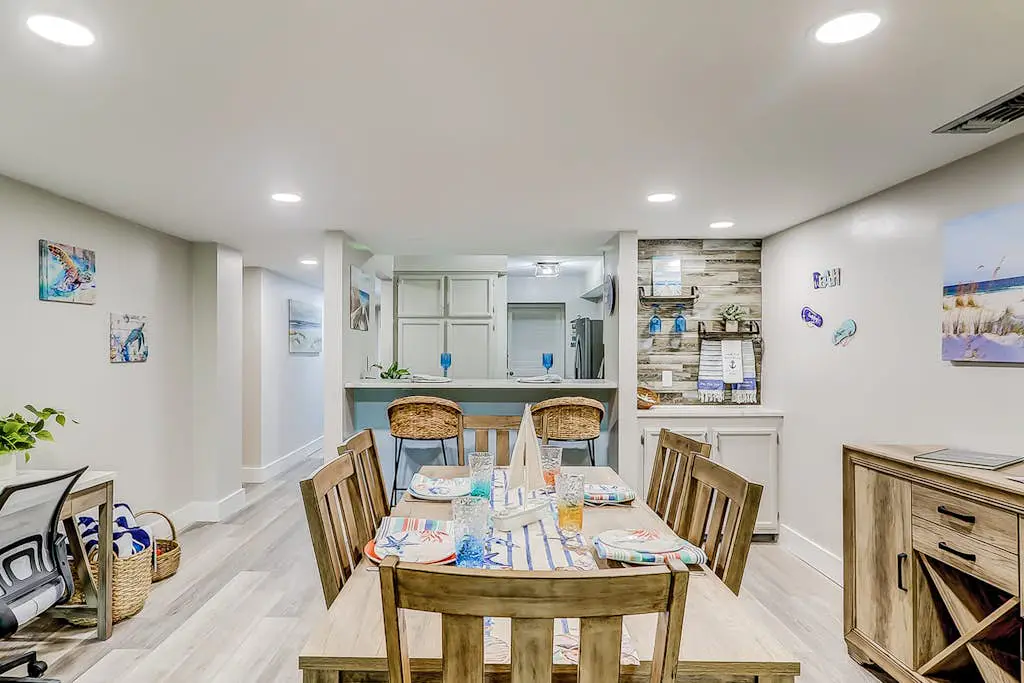 4th-floor villa with balcony, beach access, outdoor pool, & grills