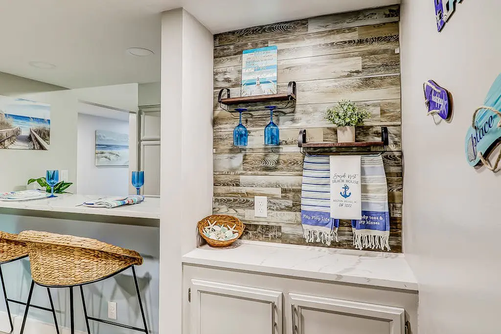 4th-floor villa with balcony, beach access, outdoor pool, & grills