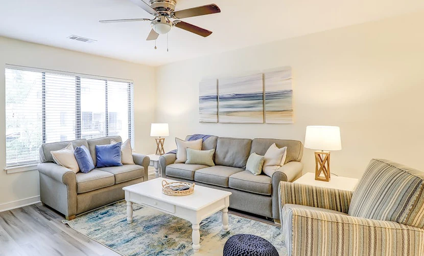 Ideally located island gem with an outdoor pool, full kitchen, & balcony