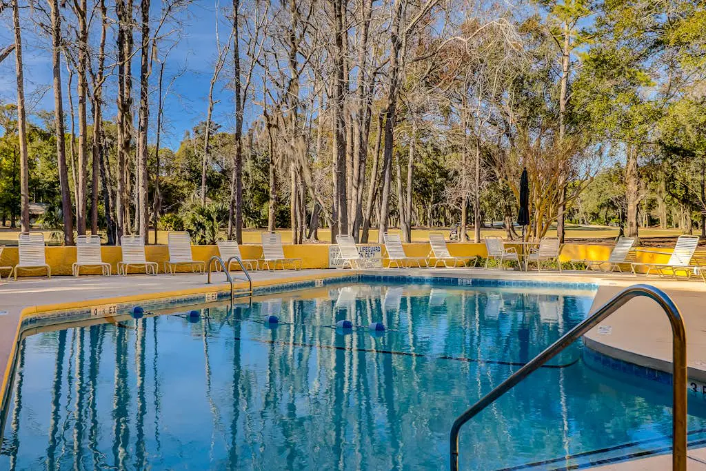 Hilton Head Island townhome with private patio, grill, seasonal pool, & golf