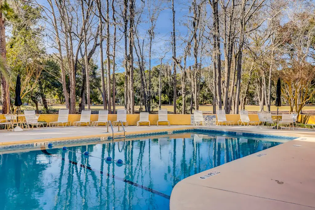 Hilton Head Island townhome with private patio, grill, seasonal pool, & golf