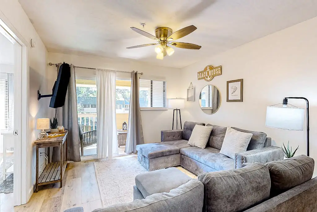 Vibrant condo with tennis courts, pool, W/D, gas grill, balcony, & playground