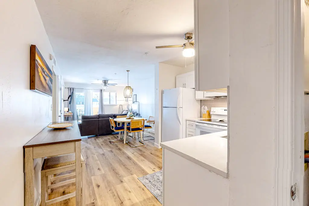 Vibrant condo with tennis courts, pool, W/D, gas grill, balcony, & playground