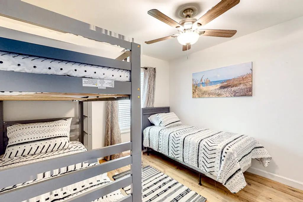 Vibrant condo with tennis courts, pool, W/D, gas grill, balcony, & playground