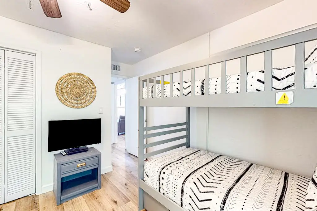 Vibrant condo with tennis courts, pool, W/D, gas grill, balcony, & playground