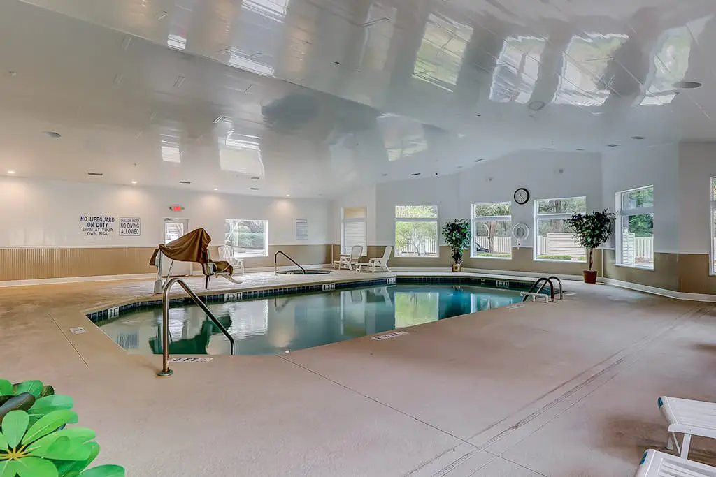 Vibrant condo with tennis courts, pool, W/D, gas grill, balcony, & playground