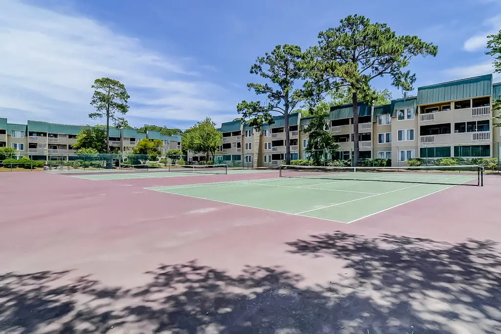 Vibrant condo with tennis courts, pool, W/D, gas grill, balcony, & playground