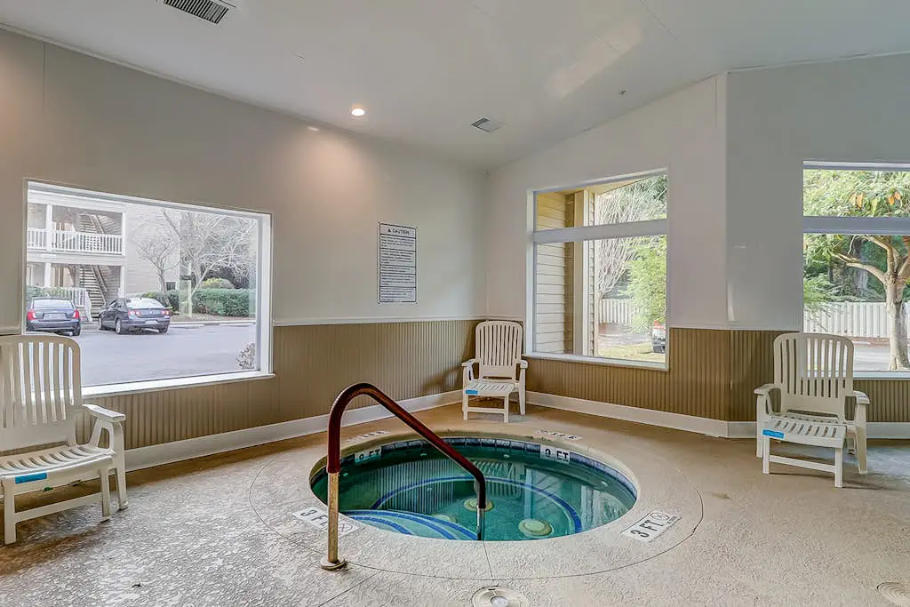 Vibrant condo with tennis courts, pool, W/D, gas grill, balcony, & playground