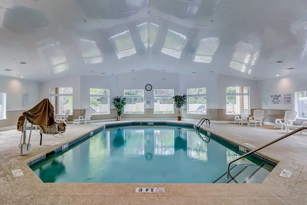 Vibrant condo with tennis courts, pool, W/D, gas grill, balcony, & playground