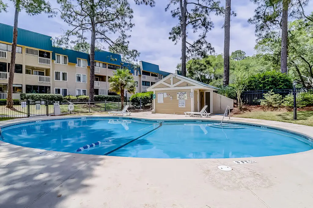 Vibrant condo with tennis courts, pool, W/D, gas grill, balcony, & playground
