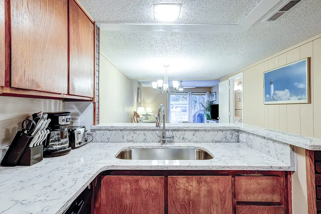 2-story condo with pool, private patio, & grill - walk to beach - near Coligny