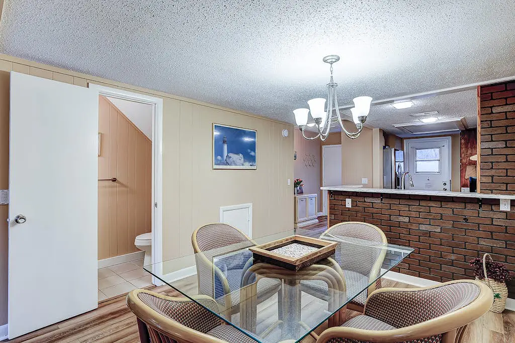 2-story condo with pool, private patio, & grill - walk to beach - near Coligny