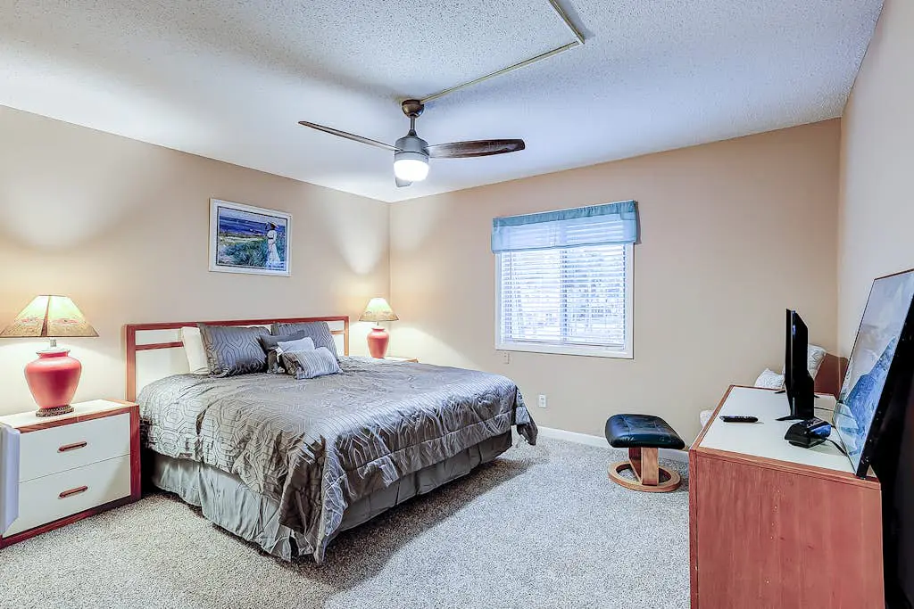2-story condo with pool, private patio, & grill - walk to beach - near Coligny