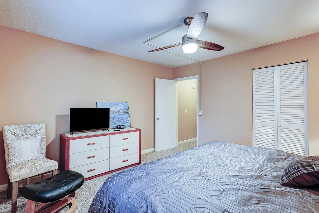 2-story condo with pool, private patio, & grill - walk to beach - near Coligny