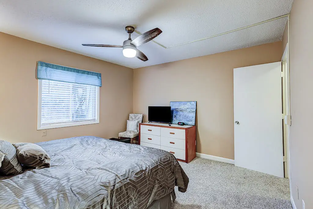 2-story condo with pool, private patio, & grill - walk to beach - near Coligny