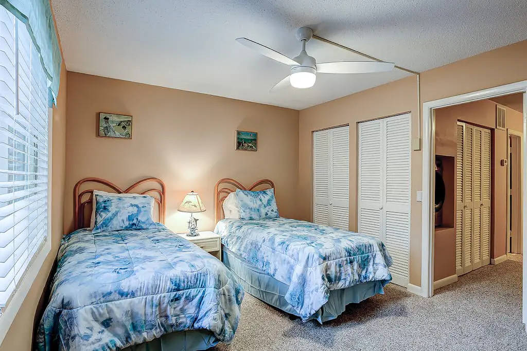 2-story condo with pool, private patio, & grill - walk to beach - near Coligny