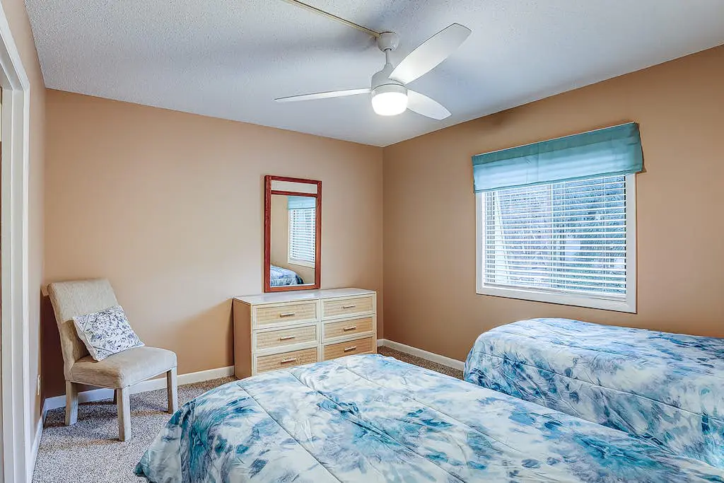 2-story condo with pool, private patio, & grill - walk to beach - near Coligny