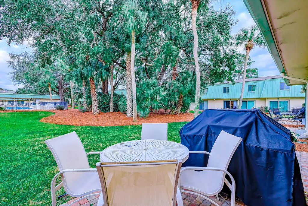 2-story condo with pool, private patio, & grill - walk to beach - near Coligny