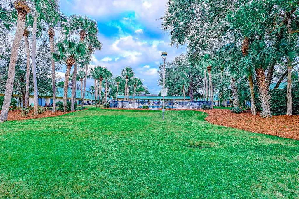 2-story condo with pool, private patio, & grill - walk to beach - near Coligny