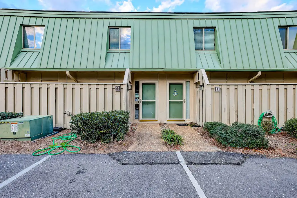 2-story condo with pool, private patio, & grill - walk to beach - near Coligny