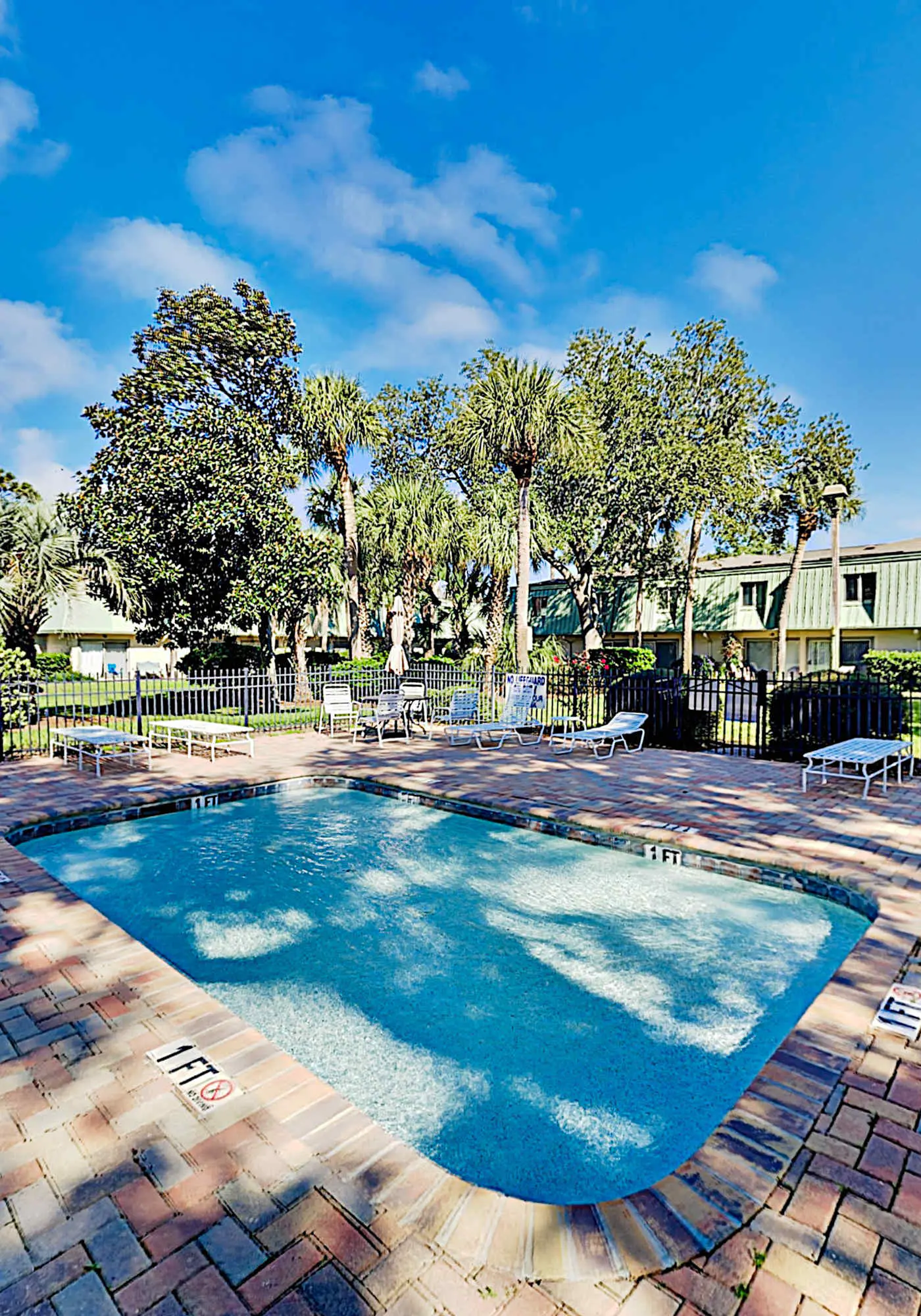 2-story condo with pool, private patio, & grill - walk to beach - near Coligny