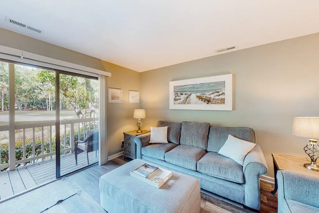 Serene villa with pool, beach access, tennis, central AC, & washer/dryer