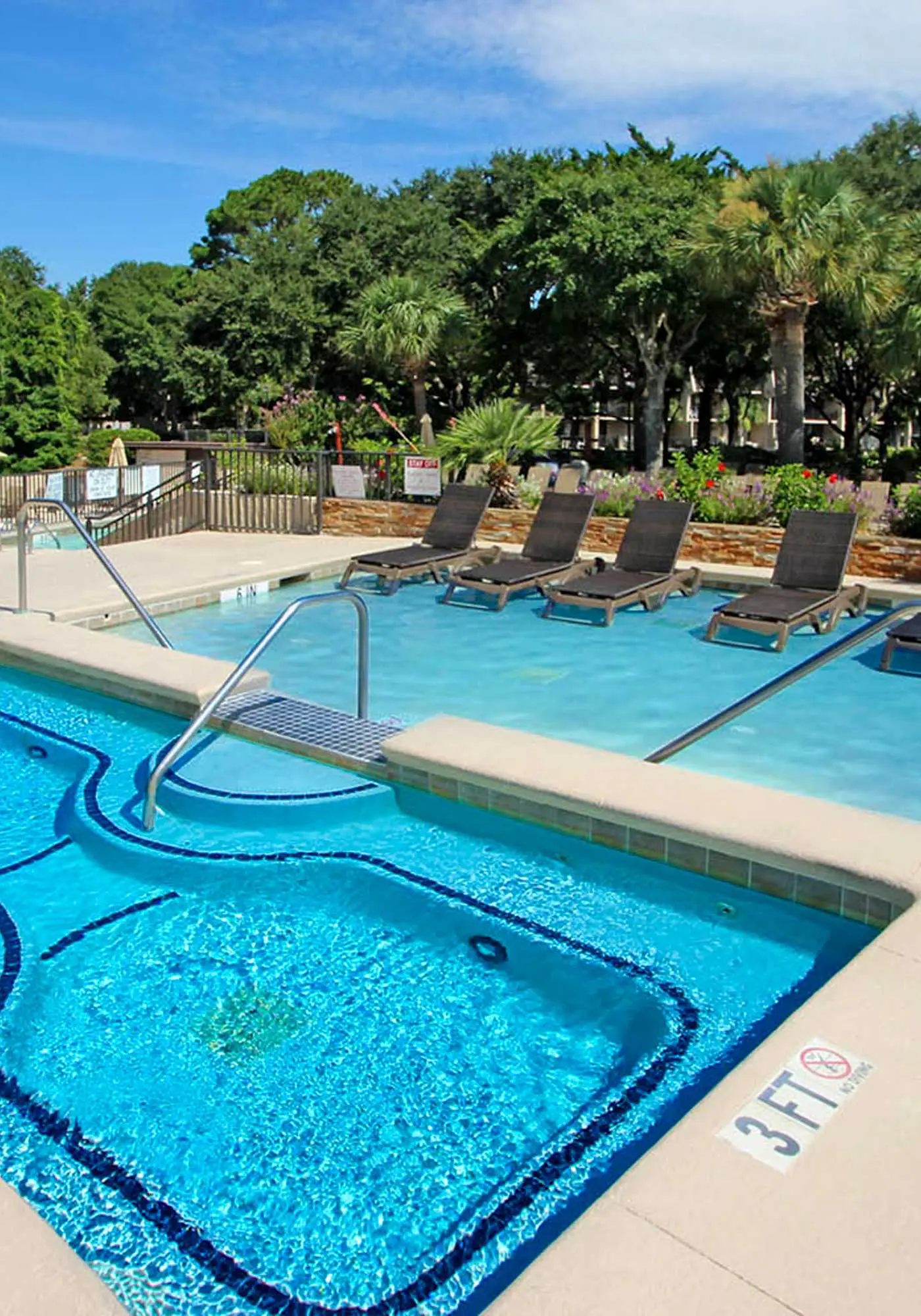 Top-floor condo with ocean views, on-site pools, beach access, & sports courts