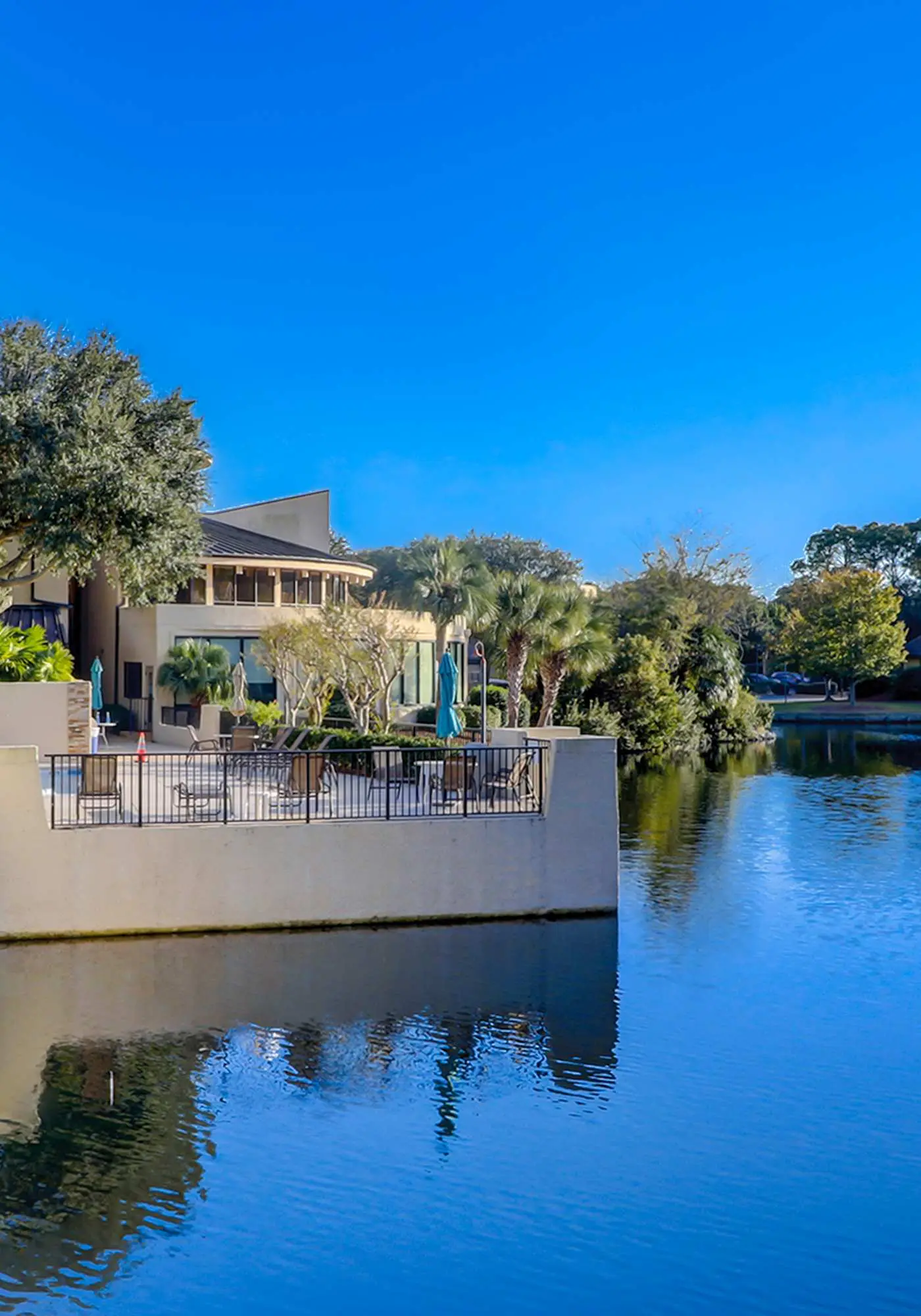Top-floor condo with ocean views, on-site pools, beach access, & sports courts