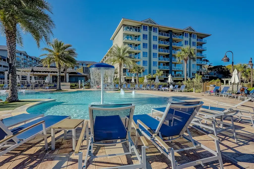 Modern condo with water views, central air-conditioning, shared pool, & hot tub