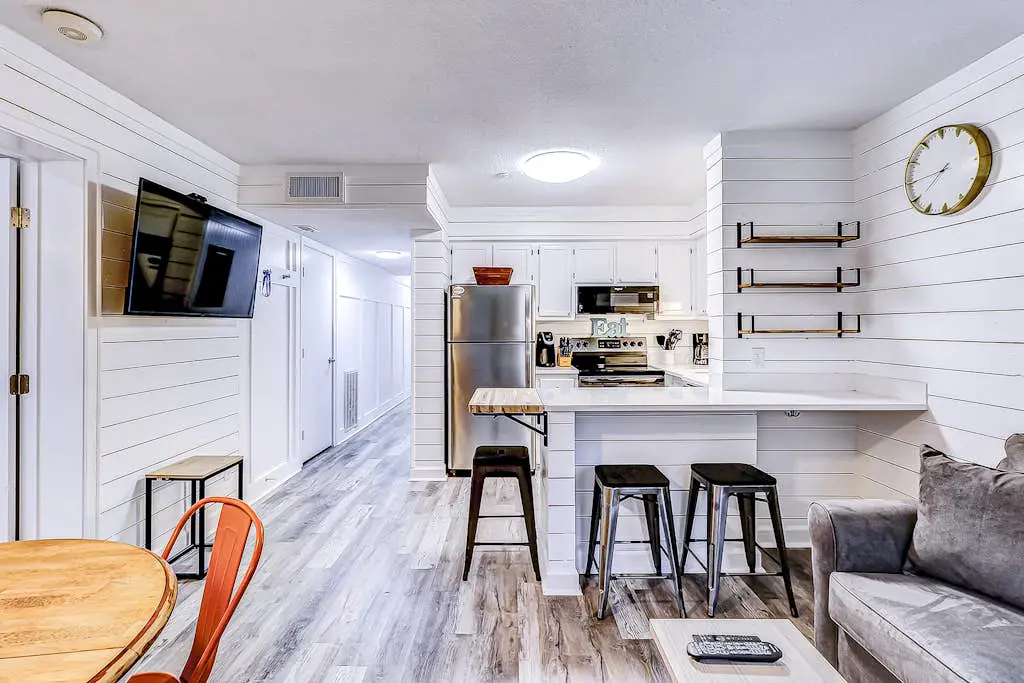 Modern condo with water views, central air-conditioning, shared pool, & hot tub