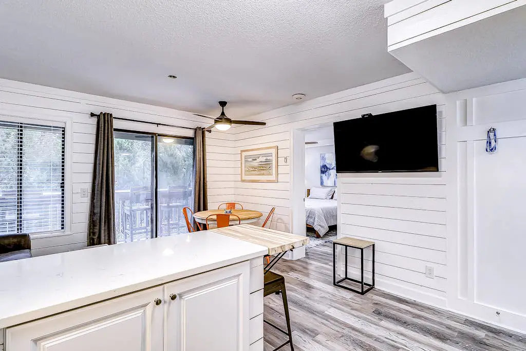 Modern condo with water views, central air-conditioning, shared pool, & hot tub