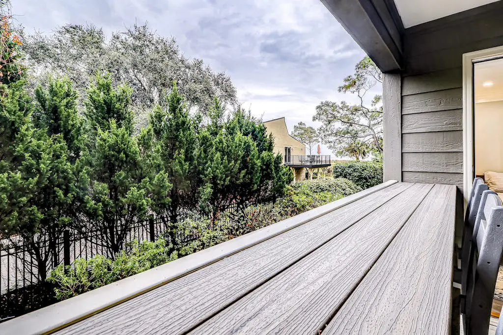 Modern condo with water views, central air-conditioning, shared pool, & hot tub