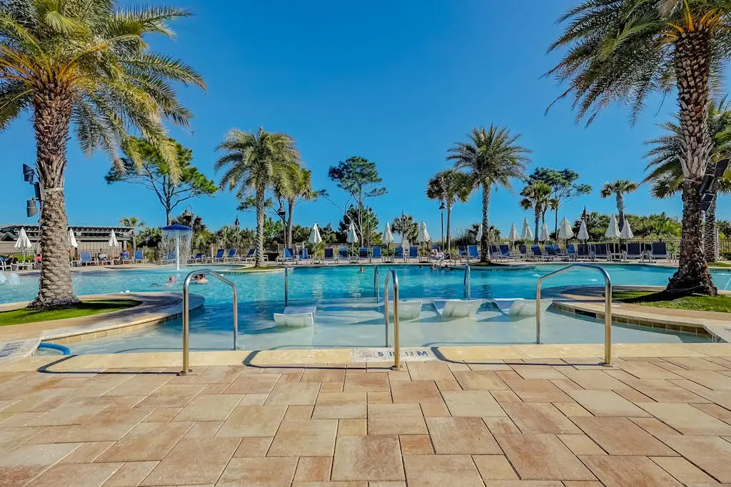 Modern condo with water views, central air-conditioning, shared pool, & hot tub